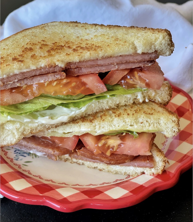 Spam, Lettuce & Tomato Sandwich | The best way to eat spam! Fry it up on your stove top and serve it with toasted bread, tomato, lettuce, and mayo. A cheap and easy lunch or dinner idea for your family!