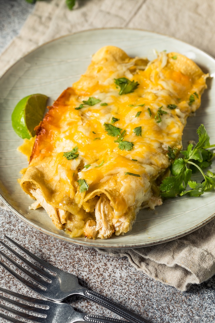 Quick & Easy Green Chile Enchilada Dinner... made with canned chicken! This is dinner recipe is a hit with my family. Grandma knows how to cook, and this recipe has been a keeper for over 30 years. 