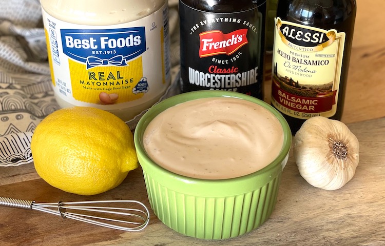 Ingredients for artichoke dipping sauce including mayo, balsamic vinegar, lemon juice, Worcestershire, and garlic.