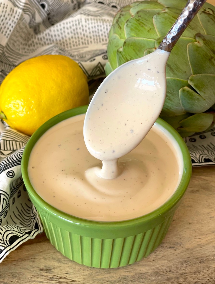 Grandma's best artichoke dipping sauce made with mayonnaise, balsamic vinegar, lemon juice, Worcestershire sauce, garlic and black pepper. So easy and delicious! This tangy sauce is addicting. 